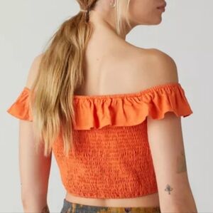 Revolve Monteau Los Angeles orange crop over the shoulder ruffle